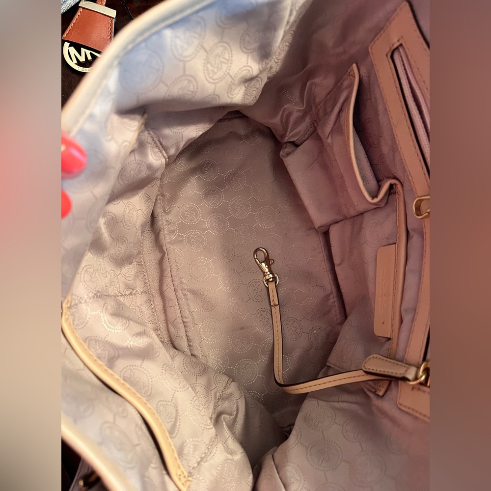 Michael Kors authentic tote and matching wallet.